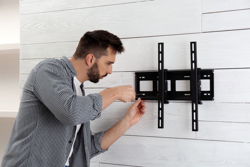 Handyman Installing Shelf
